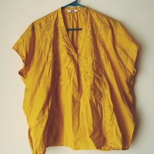Boxy yellow V-neck blouse